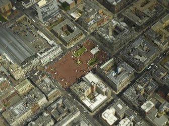 Oblique aerial view centred on George Square with the city chambers adjacent, taken from the SW.