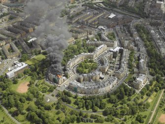 General oblique aerial view of Park Circus and the housing during the fire in Park Gate, taken from the WSW. Photograph taken in 2006.