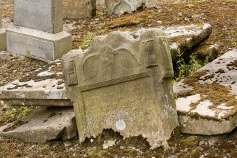 Detail of broken gravestone