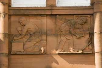 Detail of carved panel on north east facade (masonry and shipbuilding).