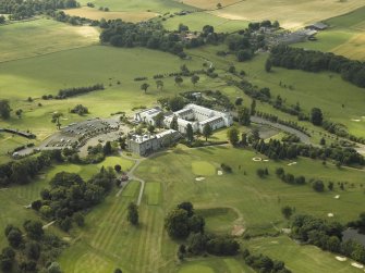 General oblique aerial view of the country house hotel and golf course, taken from the ESE.