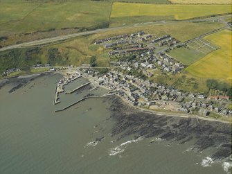 Oblique aerial view centred on the village, taken from the SE.