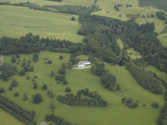 General oblique aerial view centred on the country house and policies, taken from the SSE.