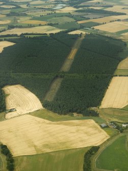 Oblique aerial view centred on the cropmarks and the remains of the Cleaven Dyke cursus monument, taken from the ESE.