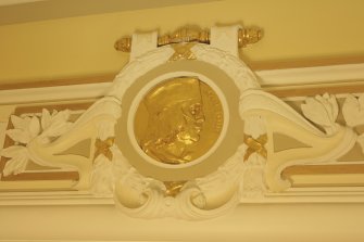 Interior. Ground floor, corridor, detail of roundel (Barbour)