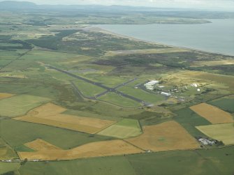 General oblique aerial view of the airfield, taken from the W.