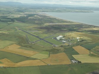 General oblique aerial view of the airfield, taken from the W.