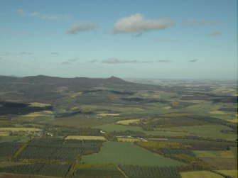 General oblique aerial view wit the remains of the fort in the distance, taken from the S.