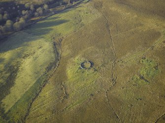 Oblique aerial view centred on the sheepfold and the remains of the sheepfolds, field-system and rig, taken from the ESE.