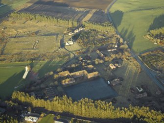 Oblique aerial view centred on the barracks, taken from the SW.
