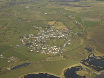 General oblique aerial view centred on the village, taken from the SSE.