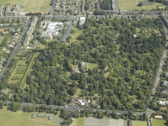 Oblique aerial view centred on the botanical garden, art gallery and house, taken from the SW.