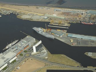 Oblique aerial view centred on the docks, taken from the SSW.