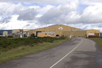 View from SE at main entrance, showing Pipe Mill buildings.