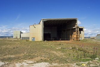 View from SE of open bay of Fabrication building to SE side of Deck Assembly building (possibly paint shop).