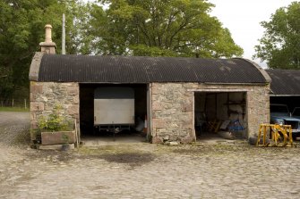 Arched roof cart shed, view from NW