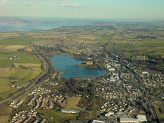 General oblique aerial view centred on the town, taken from the W.