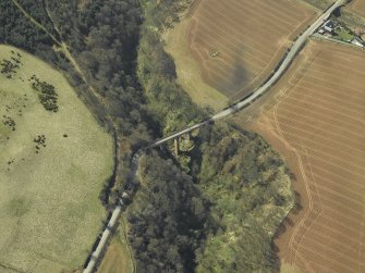 Oblique aerial view centred on the road bridge, taken from the NNE.