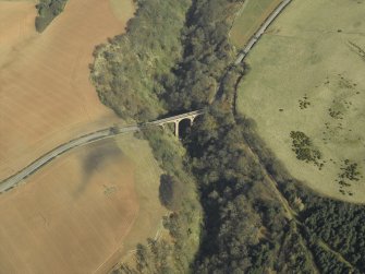 Oblique aerial view centred on the road bridge, taken from the SSW.