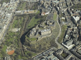 General oblique aerial view centred on the castle with the gardens, bandstand and art galleries adjacent, taken from the W.