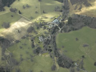 General oblique aerial view centred on the country house, gardens and stable with the walled garden and farmsteading adjacent, taken from the ENE.
