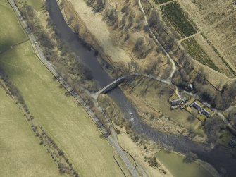 Oblique aerial view centred on the road bridge, taken from the NW.
