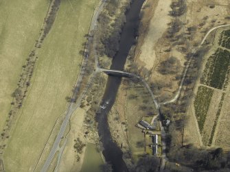 Oblique aerial view centred on the road bridge, taken from the WNW.