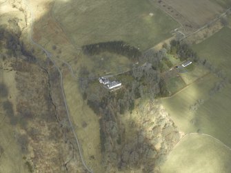 Oblique aerial view centred on country house, taken from the S.