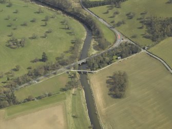 Oblique aerial view centred on the road bridges, taken from the WNW.