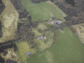 Oblique aerial view centred on the country house, walled garden, farmsteading, stables and dovecot, taken from the ESE.