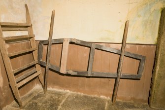 Interior. Detail of coffin carrying frame