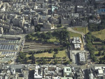 Oblique aerial view centred on the art galleries, road bridge and bank, taken from the NNW.