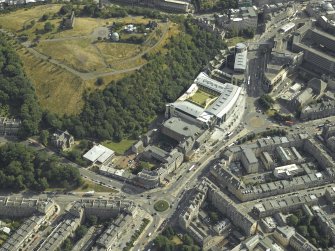 Oblique aerial view centred on the hotel, cinemas, theatre, observatories, monument and church, taken from the N.