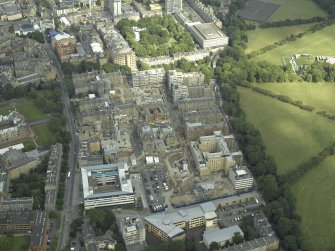 Oblique aerial view centred on the redevelopment of the hospital for housing, taken from the W.