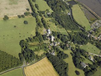 General oblique aerial view centred on the abbey, church, manse, burial-ground, school and country house, taken from the W.