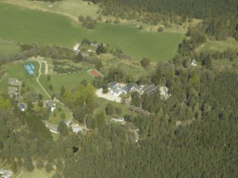 Oblique aerial view centred on the outdoor activity centre, taken from the SE.