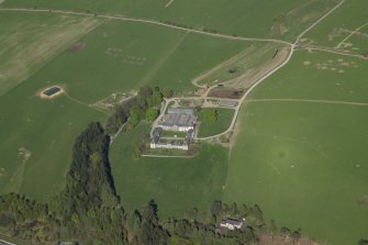 Oblique aerial view centred on the farmstead, taken from the W.