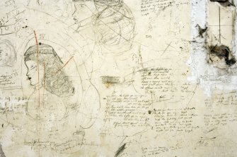 Interior.  Pencil grafitti on wall of Starting and Acetone Recovery House, heads, 'poems' and calculations.