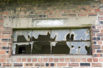 Detail.  Showing sign 'stretcher' on possible 1st Aid building