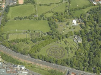 Oblique aerial view of the garden, museum and conservatory, taken from the S.