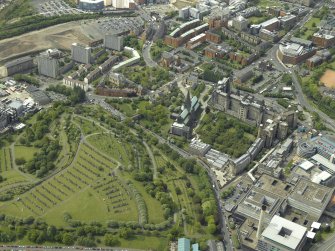 General oblique aerial view centred on the cathedral and hospital, taken from the NE.