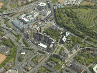 General oblique aerial view centred on the cathedral and hospital, taken from the WSW.
