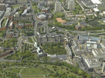 Oblique aerial view centred on the cathedral and hospital, taken from the W.