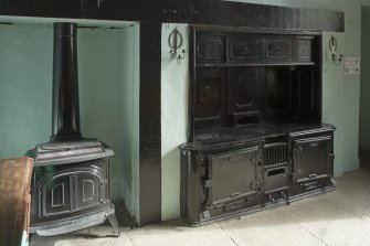 Interior. Ground floor. Communal Dining room. Cast Iron range and stove. Detail
