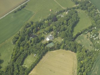 General oblique aerial view centred on the country house and walled garden with the dovecot adjacent, taken from the ESE.