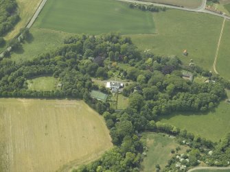 General oblique aerial view centred on the country house and walled garden with the dovecot adjacent, taken from the ENE.