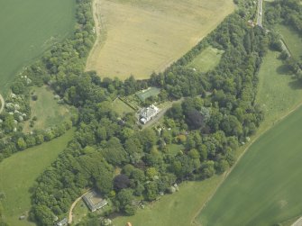 General oblique aerial view centred on the country house and walled garden with the dovecot adjacent, taken from the WNW.