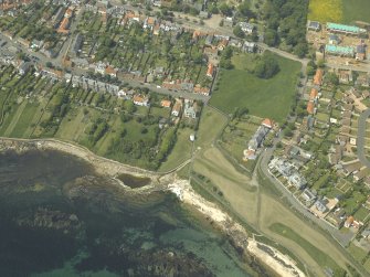 General oblique aerial view of the towncentred on the dovecot, taken from the E.