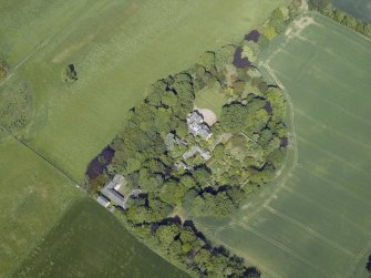 Oblique aerial view centred on the country house, conservatory, dovecot and farmsteading, taken from the SW.