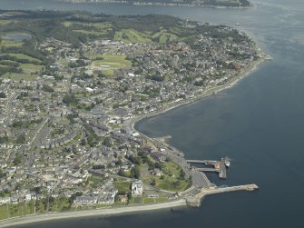 General oblique aerial view centred on the town, taken from the SSE.